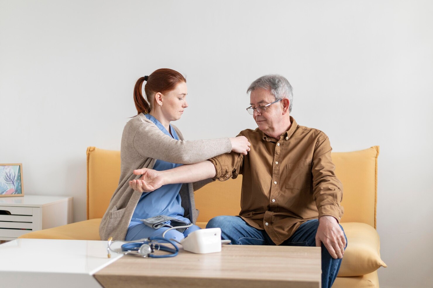 Nurse checking a male patient during a routine healthcare examination