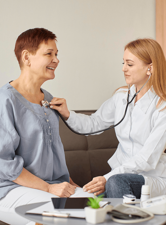 Healthcare professional providing medical care in a modern clinic setting.