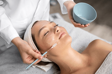 Woman receiving a therapeutic massage for relaxation and wellness.
