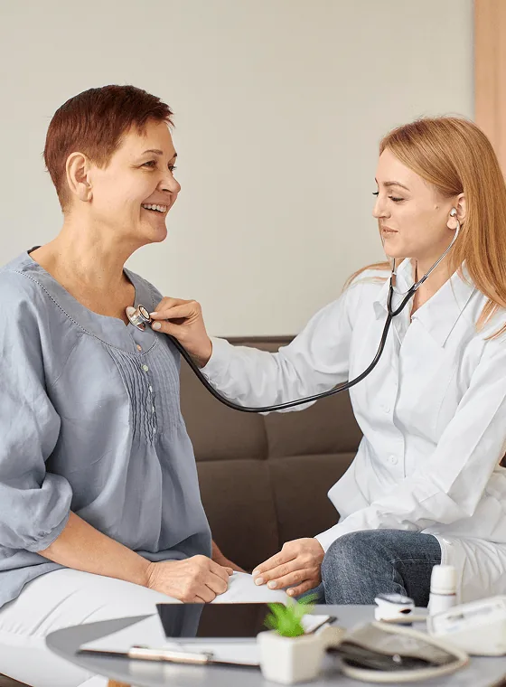 Healthcare professional providing medical care in a modern clinic setting.